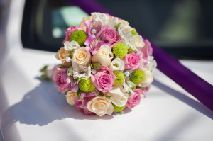Beautiful wedding bouquet of fresh pink roses bridal flowers